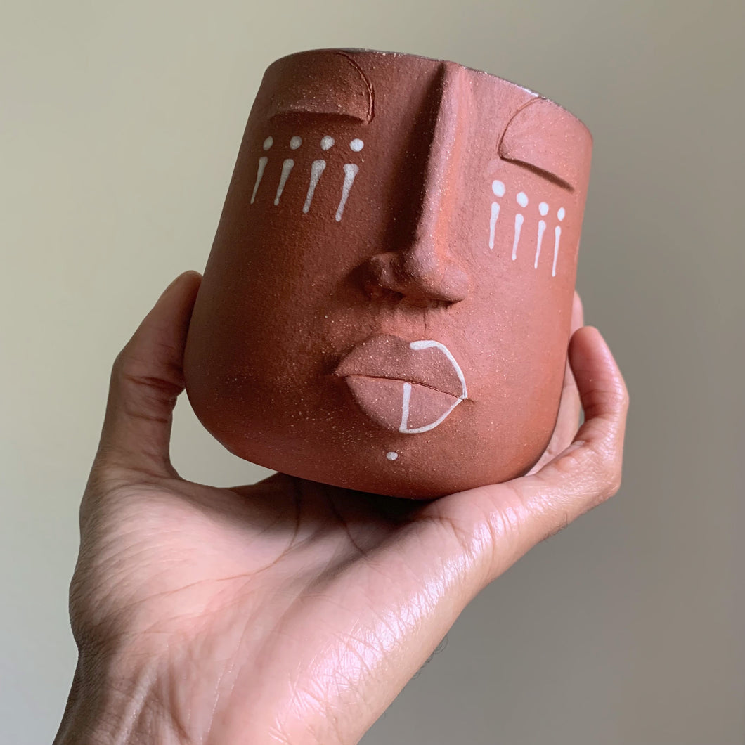 Face vase - red clay